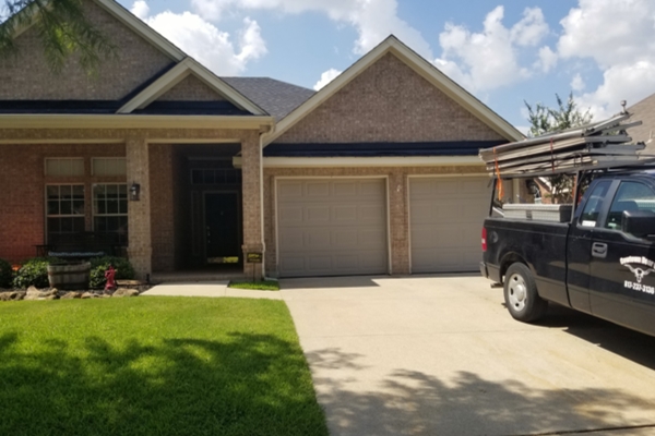 2 small sandstone garage doors