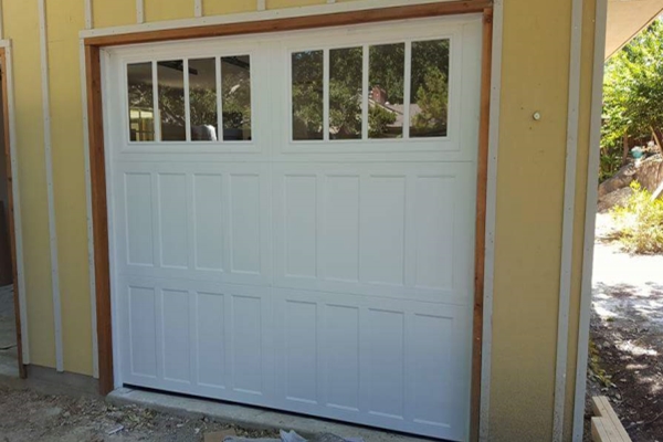 unpainted carriage garage door