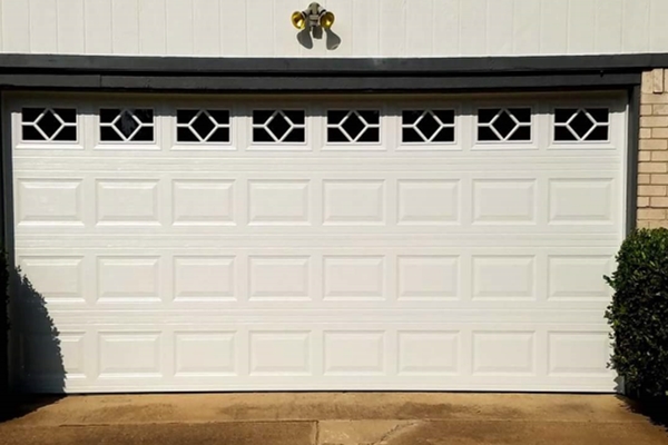white 16x7 garage door with windows and inserts